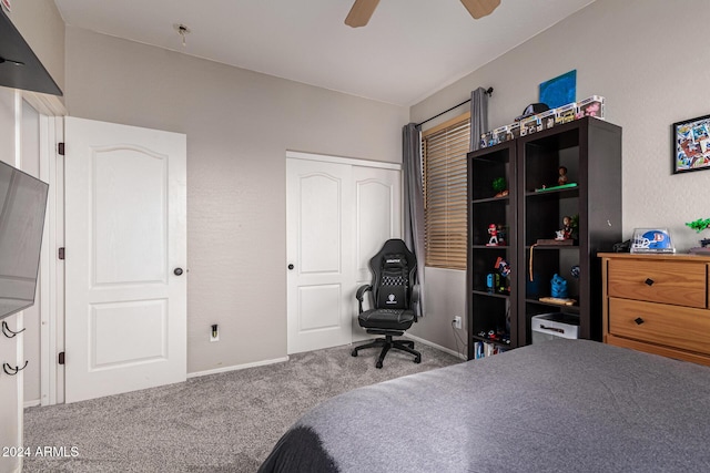 bedroom with carpet flooring, ceiling fan, and a closet