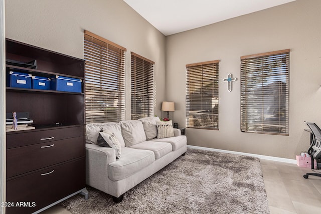 living room with light tile patterned floors