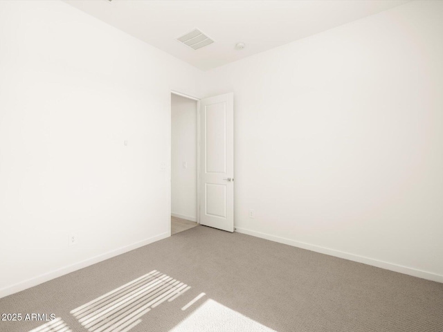 unfurnished room with carpet