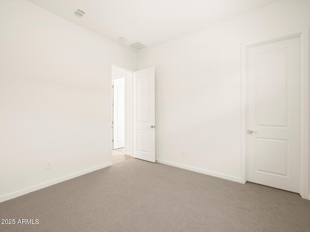 empty room with light carpet