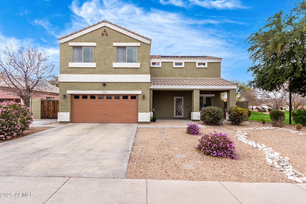 view of front of property with a garage