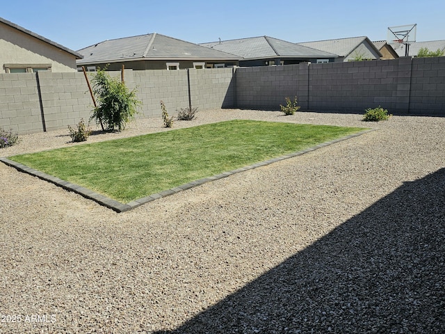 view of yard featuring a fenced backyard
