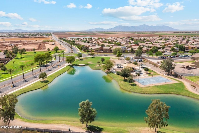 bird's eye view with a residential view and a water and mountain view