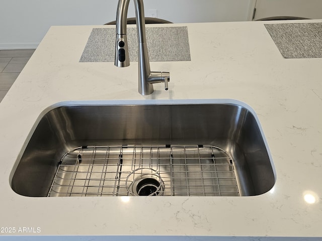 interior details featuring a sink