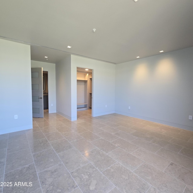 6587 N Palmeraie Blvd Unit 2022, Paradise Valley, AZ 85253 - empty room featuring recessed lighting and light tile patterned floors