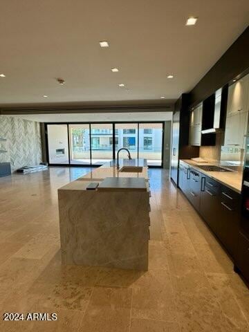 6587 N Palmeraie Blvd Unit 2022, Paradise Valley, AZ 85253 - kitchen featuring modern cabinets, a kitchen island with sink, plenty of natural light, light countertops, and recessed lighting