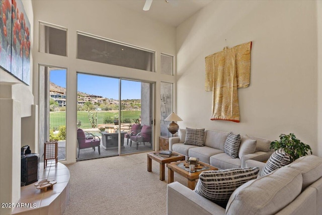 9432 N Longfeather, Fountain Hills, AZ 85268 - carpeted living room featuring a high ceiling and a ceiling fan