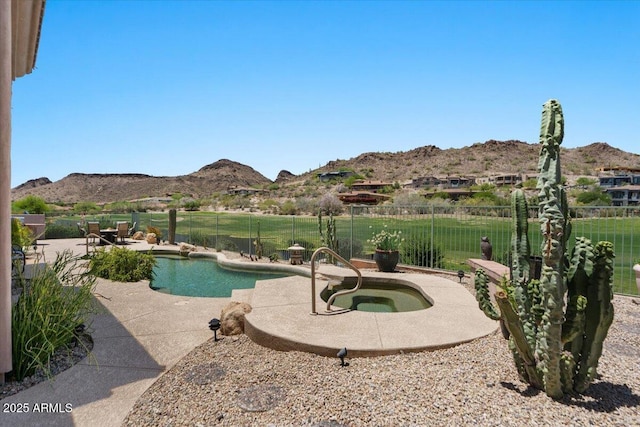 9432 N Longfeather, Fountain Hills, AZ 85268 - view of swimming pool featuring a mountain view, an in-ground hot tub, a fenced backyard, and a patio area