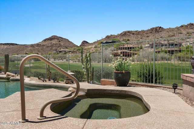 9432 N Longfeather, Fountain Hills, AZ 85268 - view of swimming pool with a mountain view and an in-ground hot tub