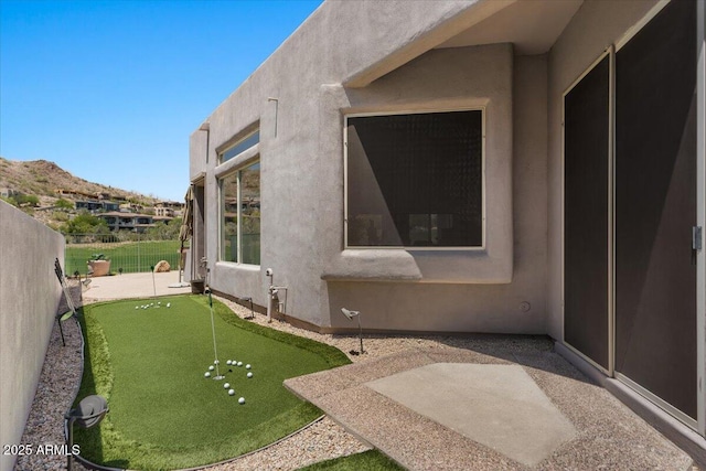 9432 N Longfeather, Fountain Hills, AZ 85268 - view of yard with a putting green, a patio area, and fence