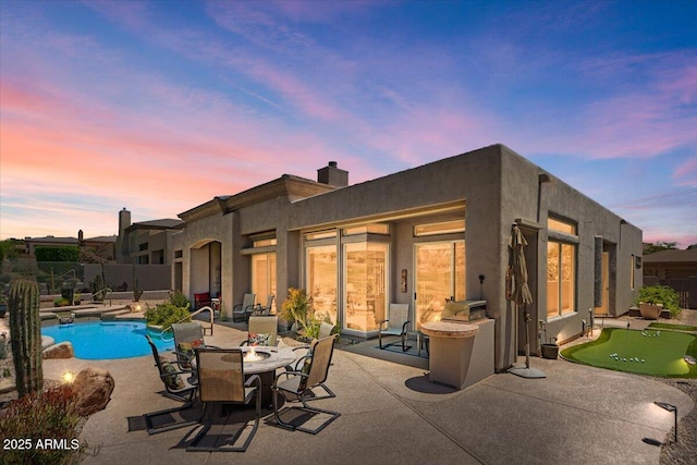 9432 N Longfeather, Fountain Hills, AZ 85268 - rear view of house with a putting green, a patio area, a chimney, fence, and stucco siding