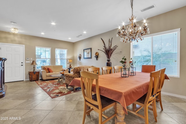 dining area with light tile patterned floors, baseboards, visible vents, and recessed lighting