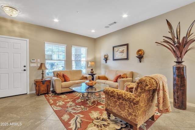 living room featuring recessed lighting, visible vents, baseboards, and light tile patterned floors