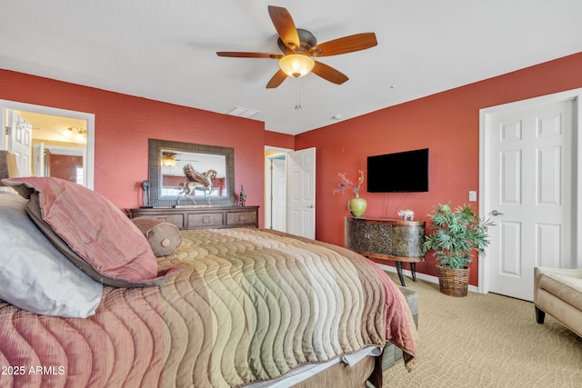 bedroom with carpet, baseboards, and ceiling fan