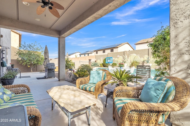 view of patio featuring ceiling fan, an outdoor hangout area, a fenced backyard, and a grill