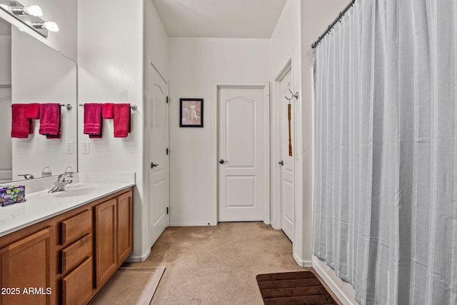18057 W Port Royale Ln, Surprise, AZ 85388 - full bathroom with baseboards, curtained shower, and vanity