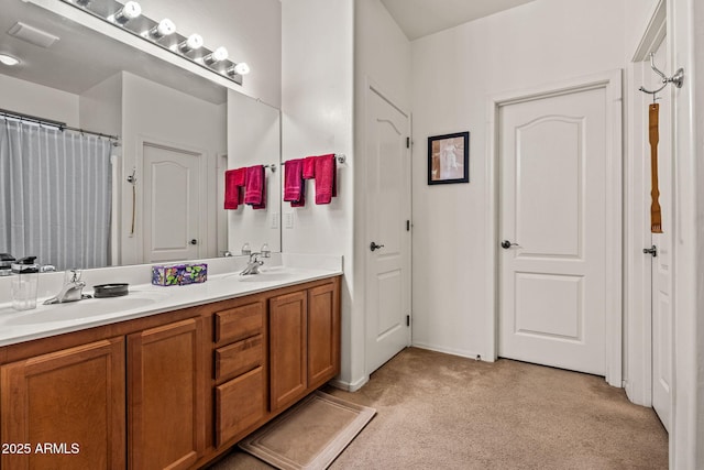 18057 W Port Royale Ln, Surprise, AZ 85388 - full bath with double vanity, a sink, and carpet floors