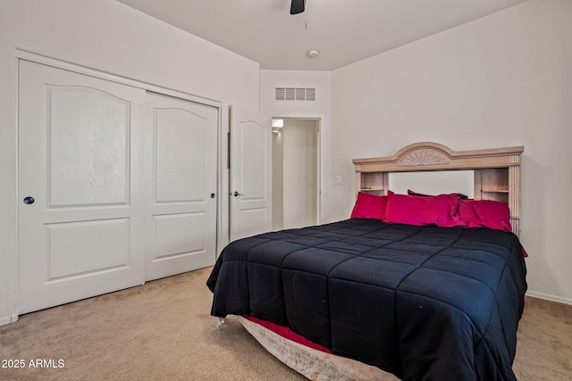 18057 W Port Royale Ln, Surprise, AZ 85388 - carpeted bedroom featuring a closet, visible vents, and a ceiling fan