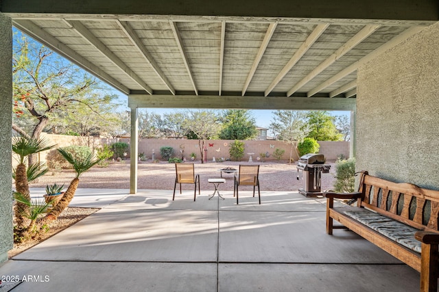 18057 W Port Royale Ln, Surprise, AZ 85388 - view of patio featuring a fenced backyard and grilling area
