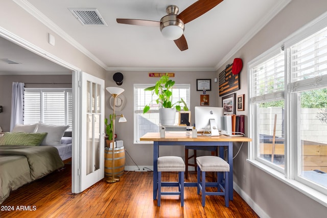 home office with ceiling fan, hardwood / wood-style floors, and ornamental molding