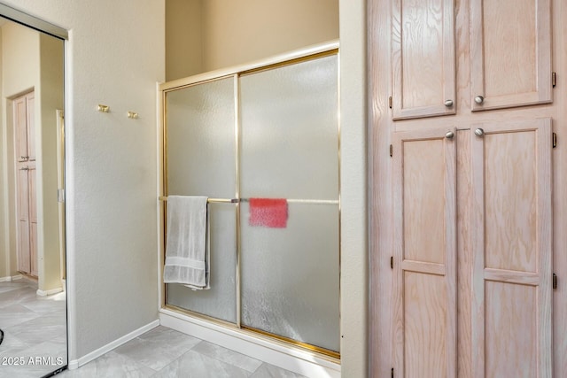 bathroom with an enclosed shower