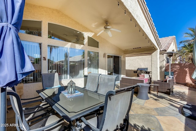 view of patio featuring ceiling fan