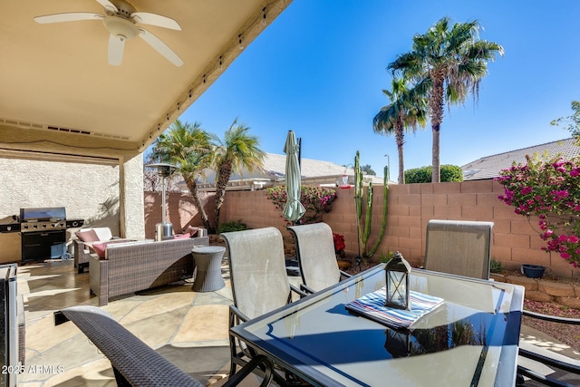 view of patio featuring ceiling fan, a grill, and outdoor lounge area