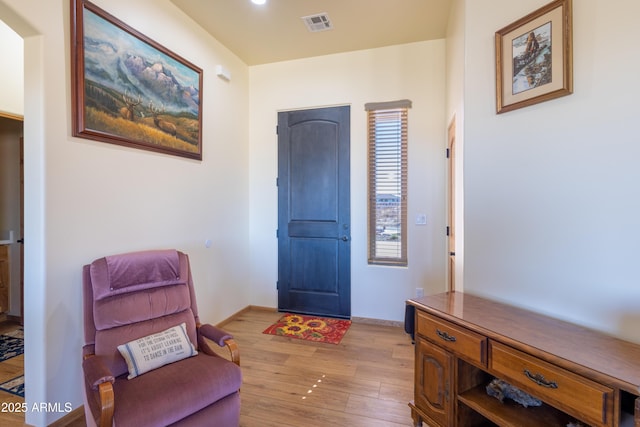 foyer with light hardwood / wood-style flooring