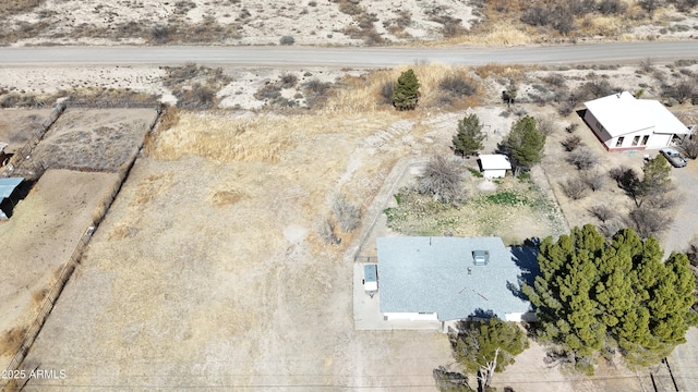 bird's eye view with a desert view