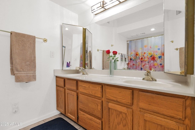 8651 E Royal Palm Rd Unit 121, Scottsdale, AZ 85258 - bathroom with double vanity, tile patterned flooring, and curtained shower