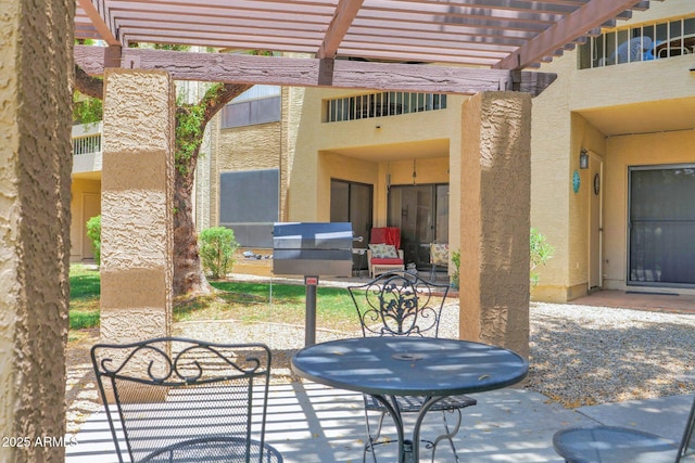 8651 E Royal Palm Rd Unit 121, Scottsdale, AZ 85258 - view of patio / terrace with a pergola