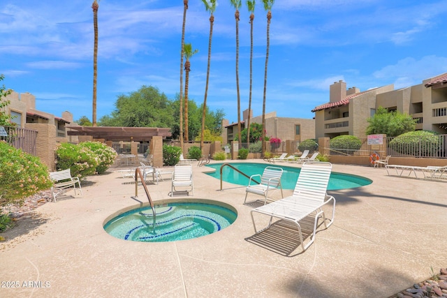 8651 E Royal Palm Rd Unit 121, Scottsdale, AZ 85258 - community pool featuring a hot tub, a patio, and a residential view