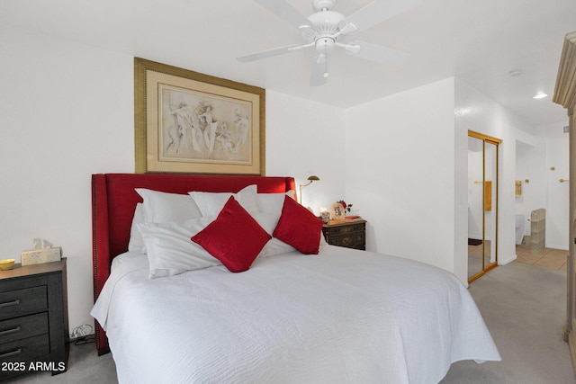 8651 E Royal Palm Rd Unit 121, Scottsdale, AZ 85258 - carpeted bedroom featuring ceiling fan and ensuite bathroom