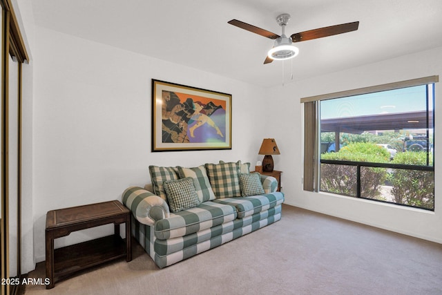 8651 E Royal Palm Rd Unit 121, Scottsdale, AZ 85258 - carpeted living area with a ceiling fan