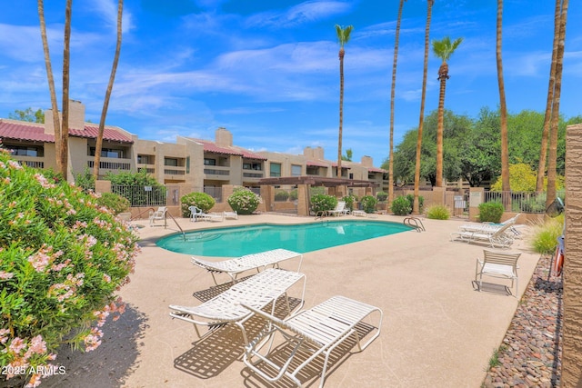 8651 E Royal Palm Rd Unit 121, Scottsdale, AZ 85258 - community pool with a patio area