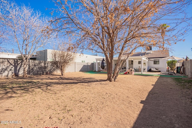view of yard with a fenced backyard and a patio area