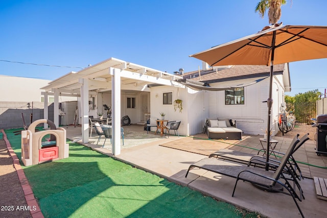 rear view of property with a patio area, fence, and a pergola