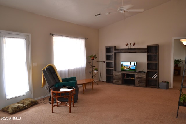 2740 E Walnut Dr, Show Low, AZ 85901 - carpeted living area featuring healthy amount of natural light, a ceiling fan, and vaulted ceiling