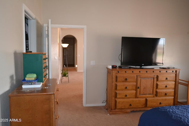 2740 E Walnut Dr, Show Low, AZ 85901 - bedroom featuring carpet flooring, arched walkways, and baseboards