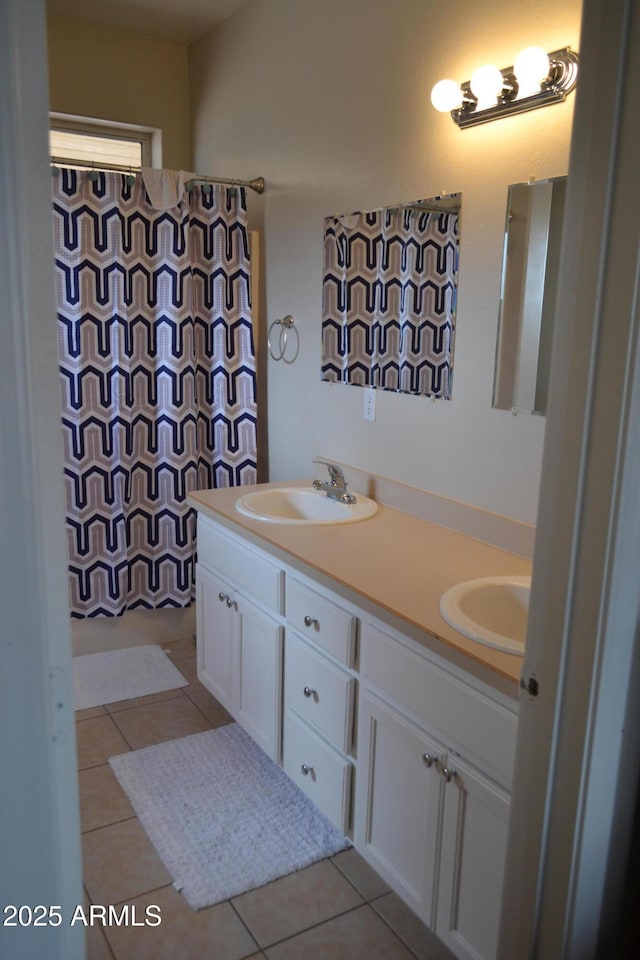2740 E Walnut Dr, Show Low, AZ 85901 - full bathroom with double vanity, tile patterned flooring, and a shower with curtain