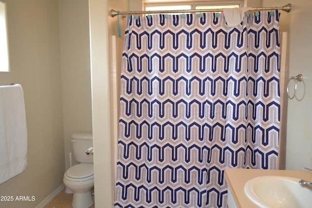 2740 E Walnut Dr, Show Low, AZ 85901 - bathroom featuring toilet, a shower with shower curtain, vanity, and baseboards