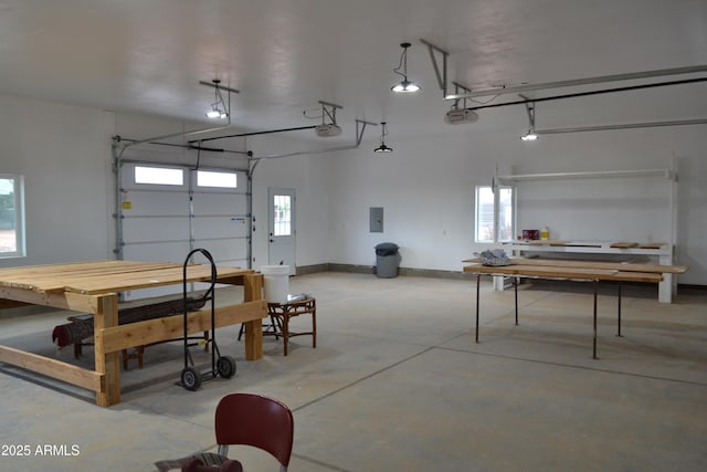 2740 E Walnut Dr, Show Low, AZ 85901 - garage with electric panel, a garage door opener, and baseboards