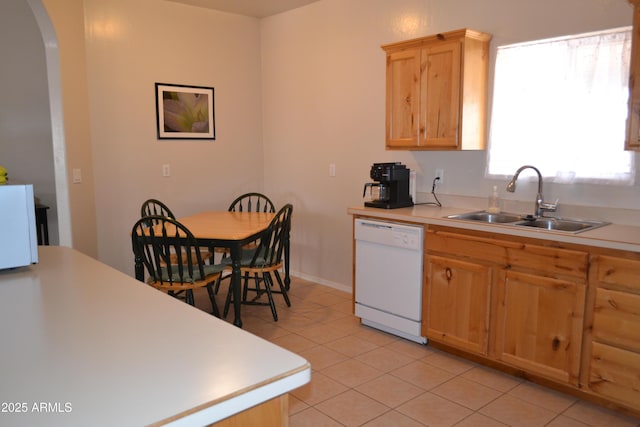 2740 E Walnut Dr, Show Low, AZ 85901 - kitchen with dishwasher, a sink, light tile patterned floors, and light countertops