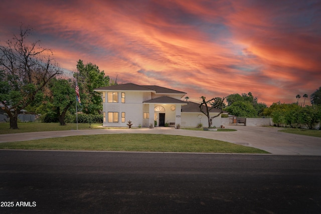 10532 W Catalina Dr, Avondale, AZ 85392 - view of front facade featuring curved driveway and stucco siding