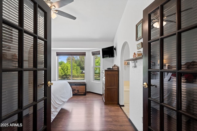 10532 W Catalina Dr, Avondale, AZ 85392 - bedroom with lofted ceiling, wood finished floors, and french doors