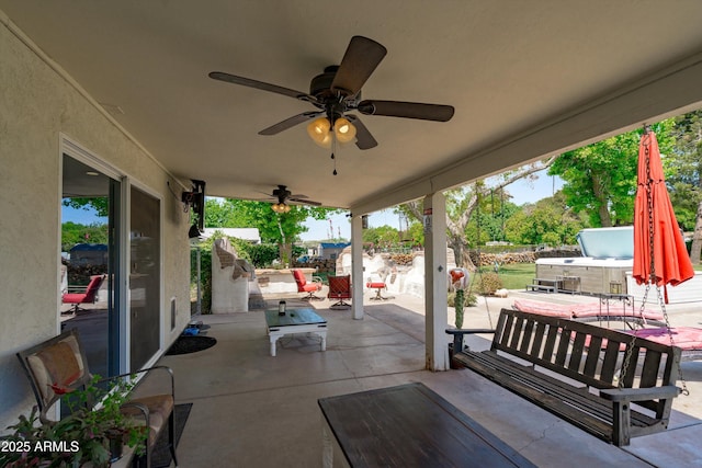 10532 W Catalina Dr, Avondale, AZ 85392 - view of patio featuring a hot tub, ceiling fan, fence, and outdoor lounge area
