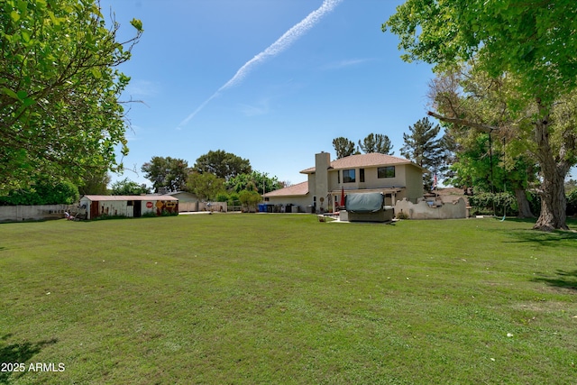 10532 W Catalina Dr, Avondale, AZ 85392 - view of grassy yard with a jacuzzi