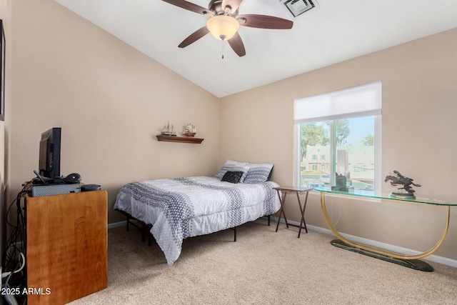 bedroom with carpet floors, visible vents, vaulted ceiling, and baseboards