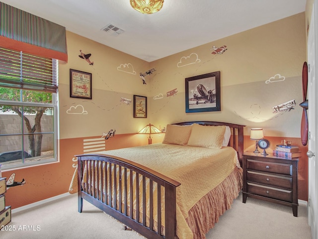 bedroom with visible vents, baseboards, and carpet floors