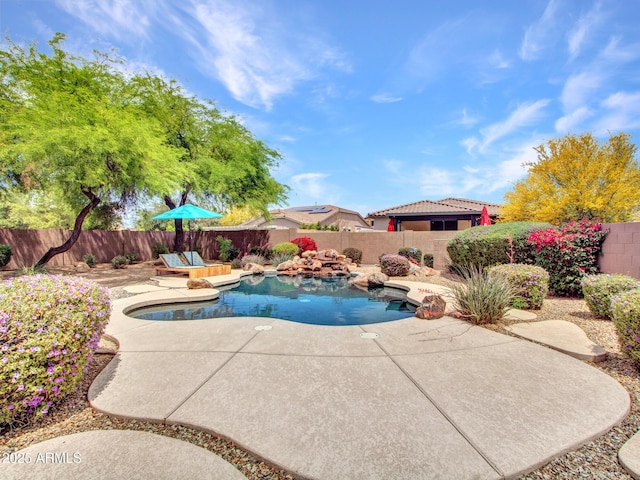 view of pool with a patio area, a fenced in pool, and a fenced backyard